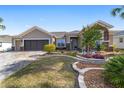 One-story home with paver driveway and nicely landscaped yard at 6839 Sw 97Th Terrace Rd, Ocala, FL 34481