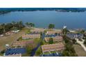 Aerial shot of waterfront community with beach access and ample parking at 11001 Se Sunset Harbor Rd # E 33, Summerfield, FL 34491