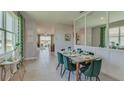 Bright dining area with view into the living room and kitchen at 4062 Nw 44Th Cir, Ocala, FL 34482