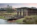 Lakeside patio with seating and kayak access at 4068 Nw 44Th Cir, Ocala, FL 34482