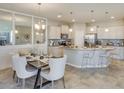 Spacious kitchen with an island, stainless steel appliances, and light-colored cabinetry at 4742 Nw 39Th Street Rd, Ocala, FL 34482