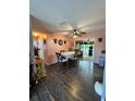 Dining area with four-person table and view into living room at 7632 Sw 112Th Ln, Ocala, FL 34476