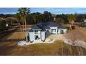 One-story home with a three-car garage and fenced backyard at 9340 Sw 9Th Ter, Ocala, FL 34476