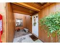 Inviting entryway with a bench and potted plants at 2701 Ne 10Th St # 707, Ocala, FL 34470