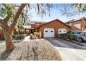 Townhome with double garage and mature landscaping at 2701 Ne 10Th St # 707, Ocala, FL 34470