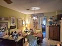 Cozy dining area with eclectic decor and access to patio at 1504 Ne 31St Pl, Ocala, FL 34479