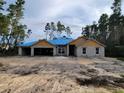 New construction home with a two-car garage, under construction at 4581 Sw 113Th Pl, Ocala, FL 34476