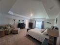 Spacious main bedroom with ample room for furniture and a sitting area at 4581 Sw 113Th Pl, Ocala, FL 34476