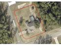 Aerial view showing house, pool, and large lot at 726 Marion Oaks Ln, Ocala, FL 34473