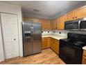 Kitchen with stainless steel appliances and wood cabinets at 13410 Sw 3Rd Ct, Ocala, FL 34473