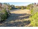 Aerial view of property showcasing a large open field at 2821 Se 80Th St, Ocala, FL 34480