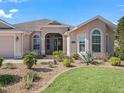Well-maintained home with desert landscaping at 3416 Eisenhower Way, The Villages, FL 32163