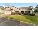 Single-story home with attached garage and landscaped yard at 4480 Nw 79Th Terrace Rd, Ocala, FL 34482