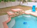 Stone waterfall feature in the pool area at 4730 Se 31St St, Ocala, FL 34480