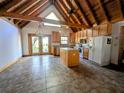 Bright kitchen featuring an island and ample cabinetry at 9100 Se 180Th Avenue Rd, Ocklawaha, FL 32179