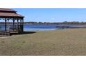 Peaceful lakefront property with gazebo and dock at 21465 Sw Honeysuckle St, Dunnellon, FL 34431