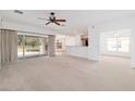 Open living space with sliding glass doors leading to the backyard at 5409 Sw 42Nd Pl, Ocala, FL 34474