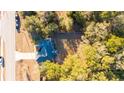 Aerial view of a house nestled in a wooded area at 7958 Juniper Rd, Ocala, FL 34480