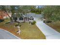 House and surrounding neighborhood captured from an aerial perspective at 8597 Sw 108Th Lane Rd, Ocala, FL 34481