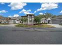 Single story home with manicured landscaping and driveway at 2021 Se Twin Bridge Cir, Ocala, FL 34471