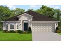 Traditional home with a gray color scheme, complemented by a two-car garage and well-manicured landscaping at 3168 Ne 46Th Ave, Ocala, FL 34470