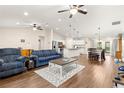 Open concept living space with kitchen, dining, and living areas at 3707 Se 24Th St, Ocala, FL 34471