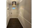 Light and airy entryway with dark hardwood floors at 3752 Se 130Th St, Belleview, FL 34420