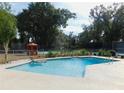 Relaxing pool with a view of the tennis court at 4960 Se 17Th St, Ocala, FL 34471