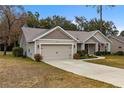 House exterior showcasing a well-maintained lawn and landscaping at 6303 Sw 116Th Street Rd, Ocala, FL 34476
