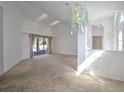 Bright living room with high ceilings and lots of natural light at 10043 Sw 202Nd Cir, Dunnellon, FL 34431