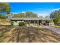 Charming one-story home with a covered porch at 10425 Se 159Th Lane, Summerfield, FL 34491