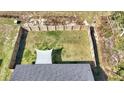 Aerial view of a fenced backyard with a sunshade at 13787 Sw 43Rd Cir, Ocala, FL 34473