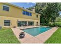 Spacious backyard with refreshing pool, perfect for relaxation at 10170 Se 106Th Ln, Belleview, FL 34420