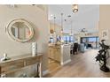 Bright and airy entryway with a view to the living room and kitchen at 438 Bouchelle Dr # 401, New Smyrna Beach, FL 32169