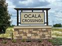 Ocala Crossings community entrance sign at 4421 Sw 90Th Pl, Ocala, FL 34476