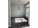 Bright dining room with carpet and chandelier at 77 Olive Dr, Ocala, FL 34472