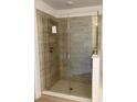 Large walk-in shower with frameless glass enclosure and tile surround at 10927 Sw 41St Ave, Ocala, FL 34476