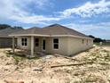 Well-built new home with an attached porch, modern windows, and a serene, spacious yard at 4373 Sw 90Th Pl, Ocala, FL 34476