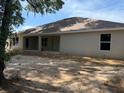 The backyard has been cleared and is ready for your custom landscaping designs at 7 Nw 45Th Loop, Ocala, FL 34470