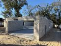 Block home under construction with garage framing at 8279 Se 159Th Pl, Summerfield, FL 34491