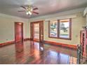 Spacious living room featuring hardwood floors and a fireplace at 309 Ne Sanchez Ave, Ocala, FL 34470