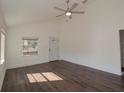 Bright living room with hardwood floors and neutral walls at 317 Ne Sanchez Ave, Ocala, FL 34470