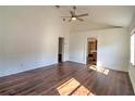 Spacious living room with hardwood floors and high ceilings at 317 Ne Sanchez Ave, Ocala, FL 34470