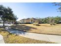 Single-story house with a two-car garage and a large yard at 6767 Sw 91St Cir, Ocala, FL 34481