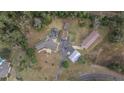Large property with multiple buildings and driveway at 4301 Se 38Th St, Ocala, FL 34480
