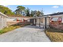 Home's entry with brickwork and covered patio at 438 Spring Ln, Ocala, FL 34472