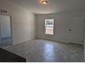 Bright dining area with tile flooring and an open floor plan at 67 Nw Sparrow Rd, Dunnellon, FL 34431