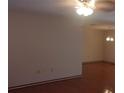 Cozy living room offering hardwood floors and a neutral color palette at 10015 Sw 90Th Ct, Ocala, FL 34481