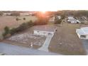 Aerial view of the property showcasing the home's expansive yard and serene setting at 10498 Sw 99Th Ave, Ocala, FL 34481