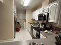 Modern kitchen featuring stainless steel appliances and ample counter space at 2857 Sw 32Nd Ave, Ocala, FL 34474